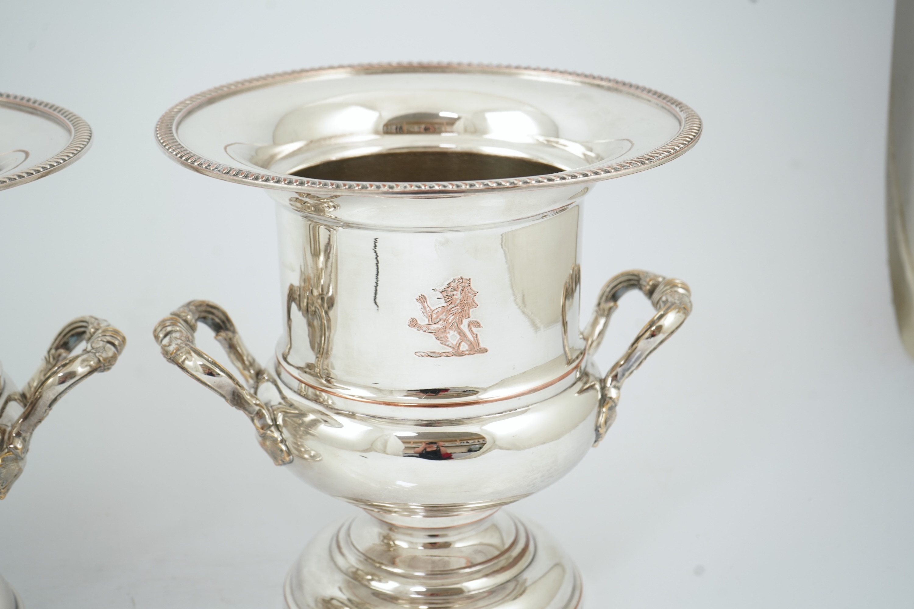 A pair of late 19th/early 20th century silver plated two handled campana shaped wine coolers, makers, FH